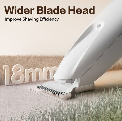 Shaving head with wider blade head labeled, improving shaving efficiency, on a grassy background.