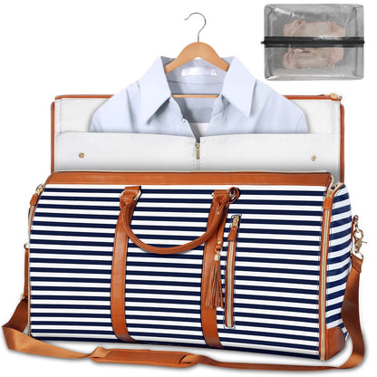 Navy and white striped duffel bag with brown leather straps and trim, containing a shirt and a clear pouch.